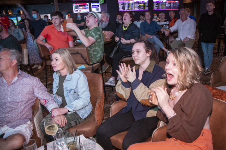 Locals cheer on Paralympian Jake Michel at Carina Leagues Club. (Pic: Ray Cash)